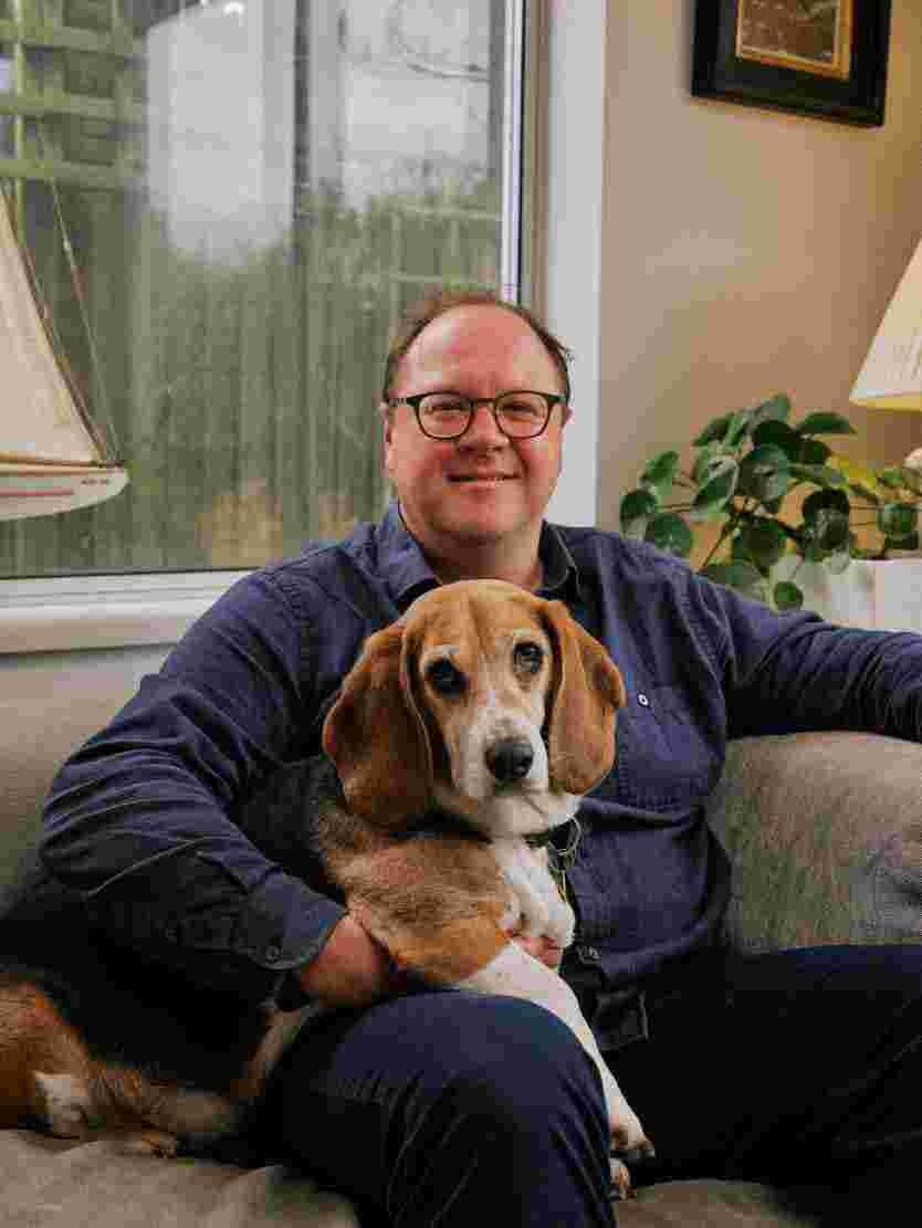 Russell Hunt, founder of PetsLets, with Biscuit
